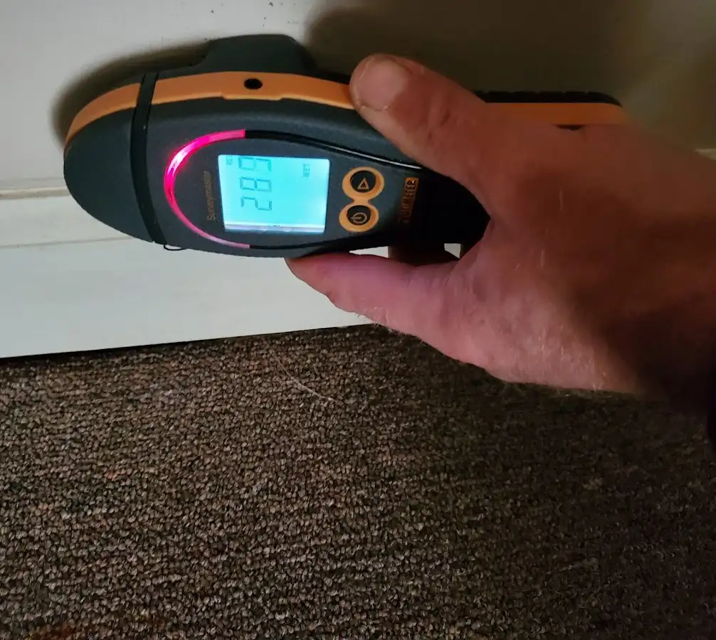 Moisture detection at baseboard during Storm Damage Restoration in Salt Lake City